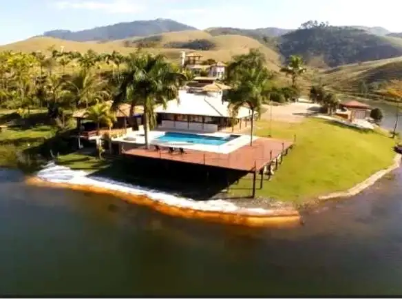 🌟 Fazenda de luxo à venda em Caçapava-SP! 1.452.000 m², 5 suítes, lago, piscina, energia solar. R$ 15M. 📞 Contate-nos! 🌄azenda em Caçapava SP